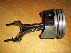 Ford 5.0L piston removed from engine.