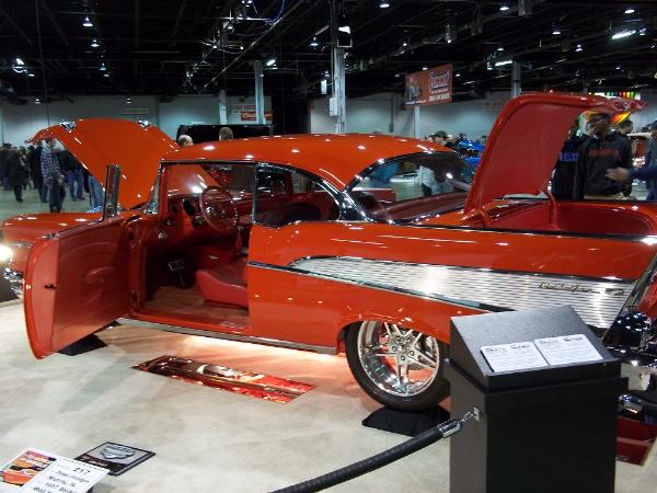 1957 Chevrolet Bel Air, orange.