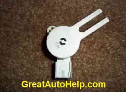 Saturn Aura brake light switch, also know as brake pedal position sensor.