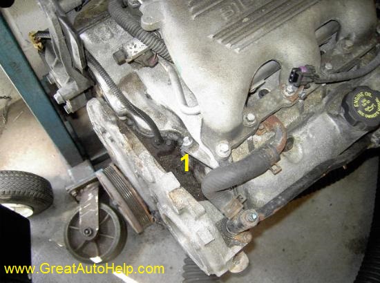 Common antifreeze leak area behind water pump / timing cover. GM 3.1l / 3.4l v6 engines- large picture