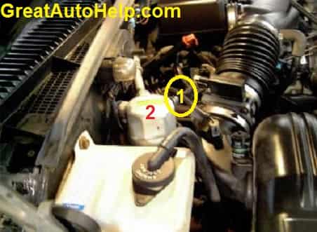 Chevy Silverado A/C freon low pressure switch location.